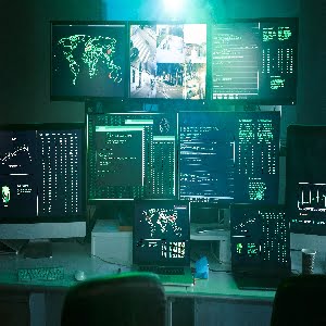 Control room monitoring surveillance video camera control city - Empty space dark room office
