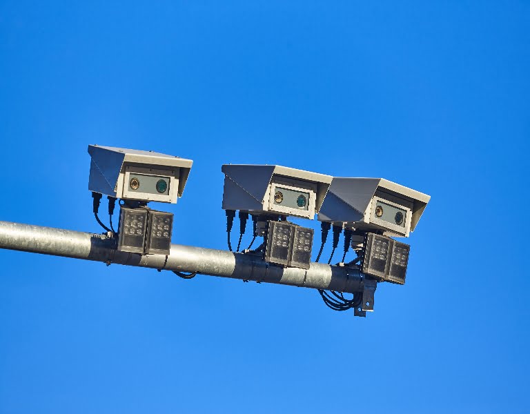 Urban traffic control surveillance camera. Street big data monit